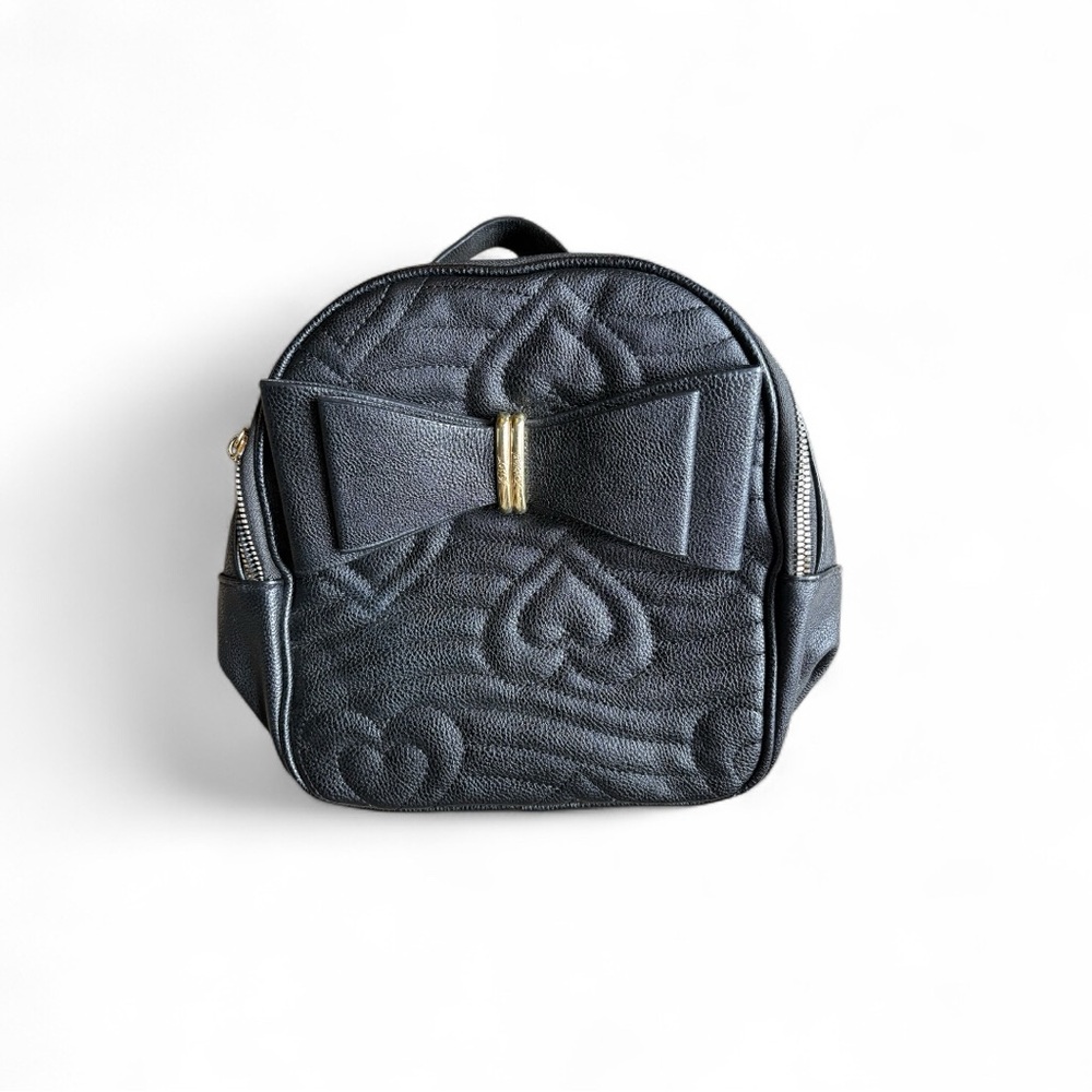 Super cute Betsy Johnson small backpack  
9 x 8 x 4